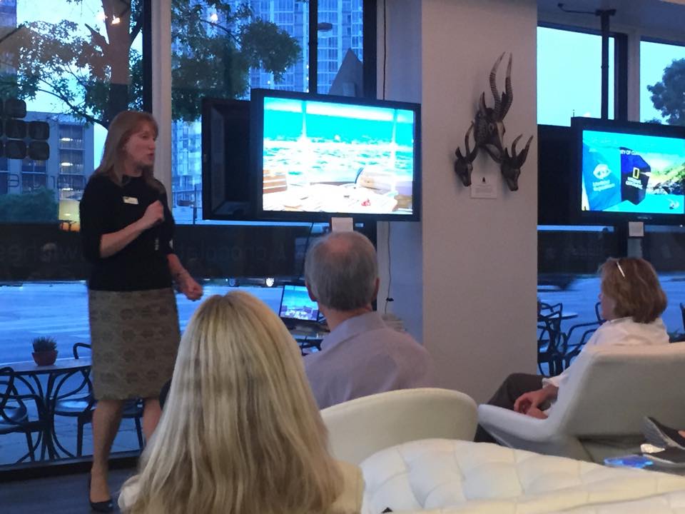 Lesa Bain, Travel Partner and VP of North America Sales of Lindblad Expedition, presenting travel.