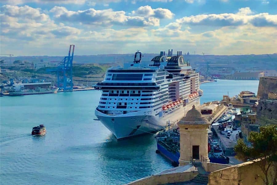 magestic coastline with huge cruise ship