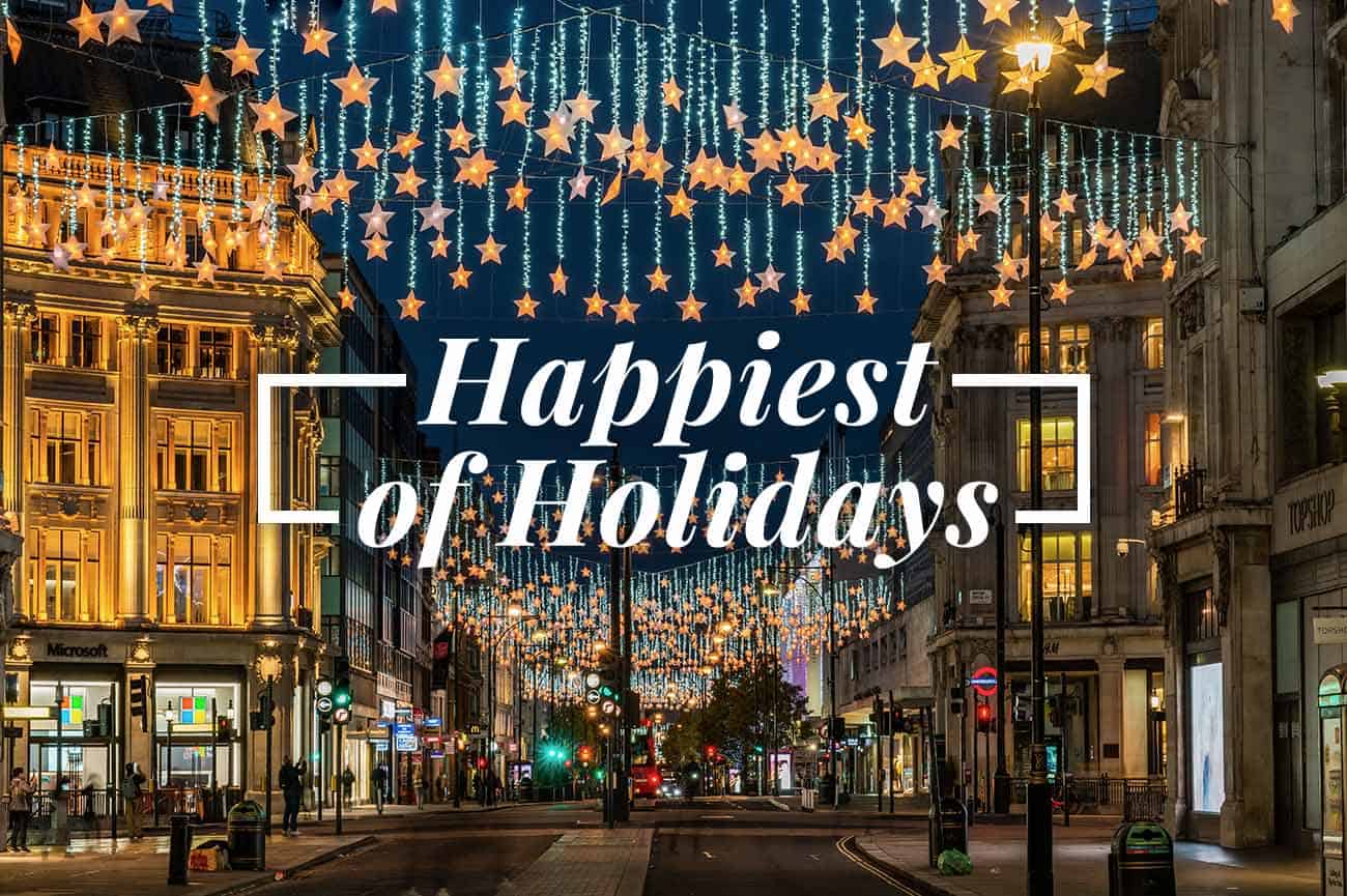 Festivities on Oxford Street, London with the text "Happiest of Holidays"