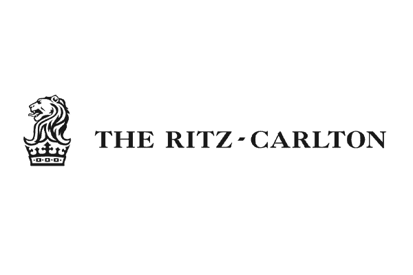 Logo of The Ritz-Carlton featuring a stylized lion above the text "THE RITZ-CARLTON."