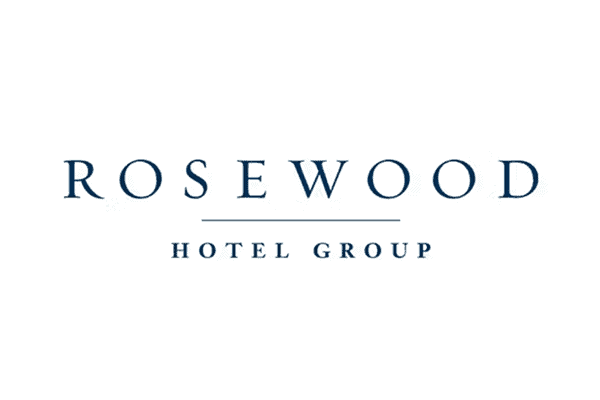 Logo of Rosewood Hotel Group, featuring the name "ROSEWOOD" in large capital letters above "HOTEL GROUP" in smaller capital letters, with a horizontal line separating the two. The text is styled in blue against a white background.